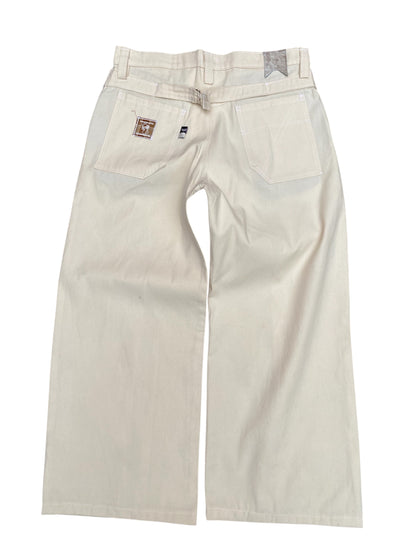 "Canva pleated trousers"